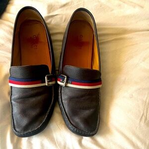 I have a pair of black loafers from Gucci. They have some wear but in good shape